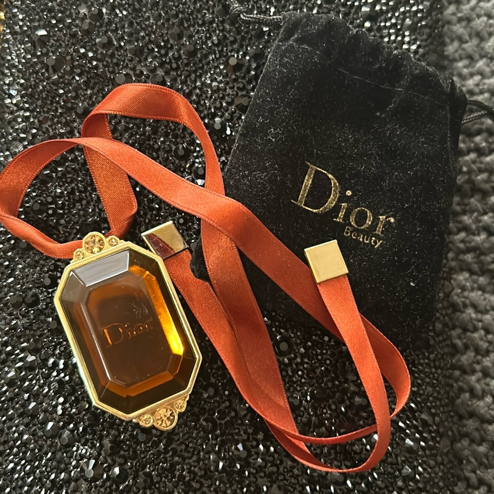 Dior beauty pendant